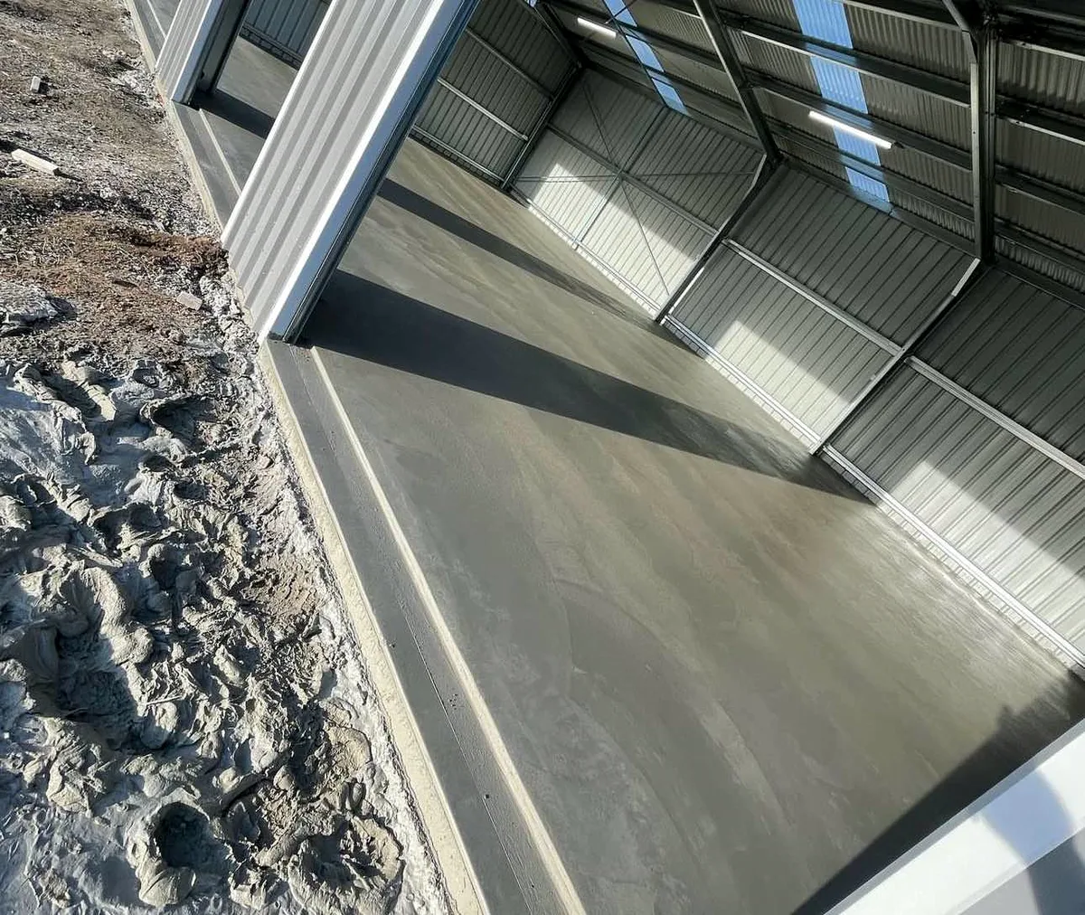 Smooth finished concrete floor inside a new shed